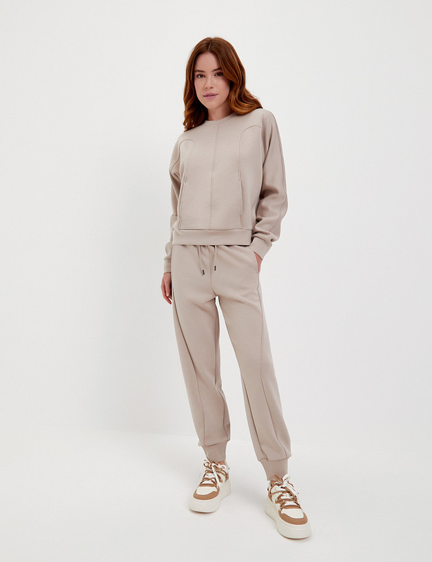 Бежевые женские спортивные брюки MASCOTTE 852-4110-2408 | ракурс 1 Бежевые женские спортивные брюки MASCOTTE 852-4110-2408 | ракурс 1
