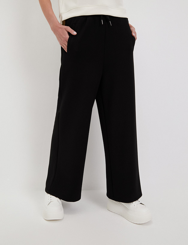 Черные женские спортивные брюки MASCOTTE 890-4108-2402 | ракурс 1 Черные женские спортивные брюки MASCOTTE 890-4108-2402 | ракурс 1